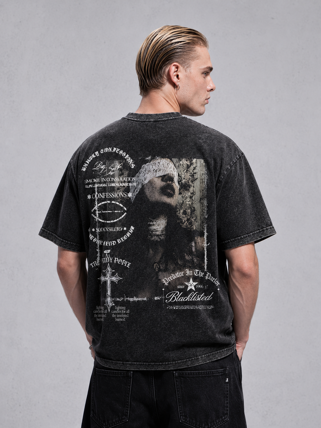 Black 240 GSM acid wash t-shirt with large vintage graphic back print, modeled from the back