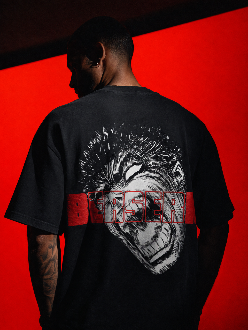 Black Berserk Fan graphic t-shirt with large manga-inspired back print and red Berserk lettering