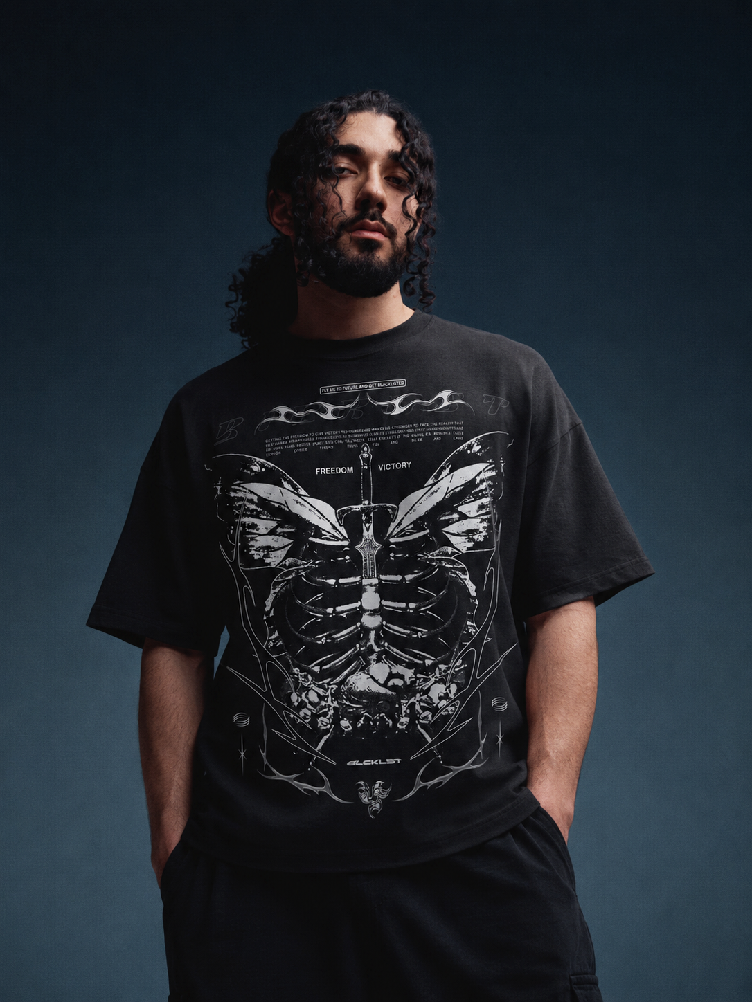 Fly Me black oversized graphic T-shirt with detailed anatomical sword artwork on the front