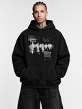 BLCKLST Not You Know black oversized graphic hoodie in 350 GSM heavyweight fabric with white front print, worn by a male model.