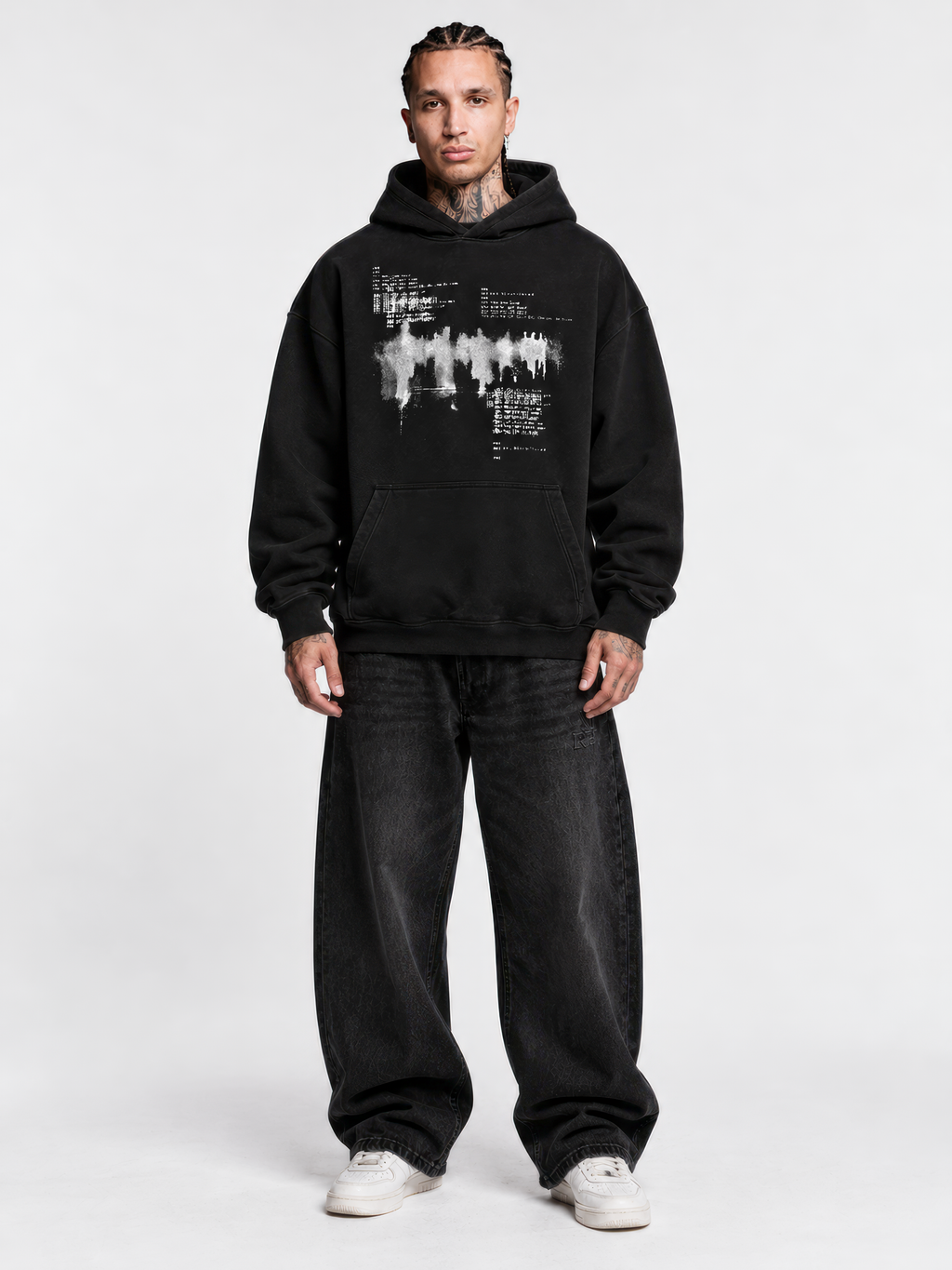 BLCKLST Not You Know black oversized graphic hoodie with white distressed front artwork, 350 GSM heavyweight fabric, and relaxed streetwear fit, modelled with black baggy jeans.